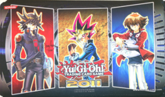 Yusei Fudo, Yami Yugi and Jaden Yuki Playmat Win-A-Mat 2011 (Signed by Dan Green (Yugi) & Greg Abbey (Yusei))
