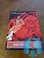 Devin Booker 2020-21 Panini Illusions Trophy Collection Red Parallel Suns 033/125