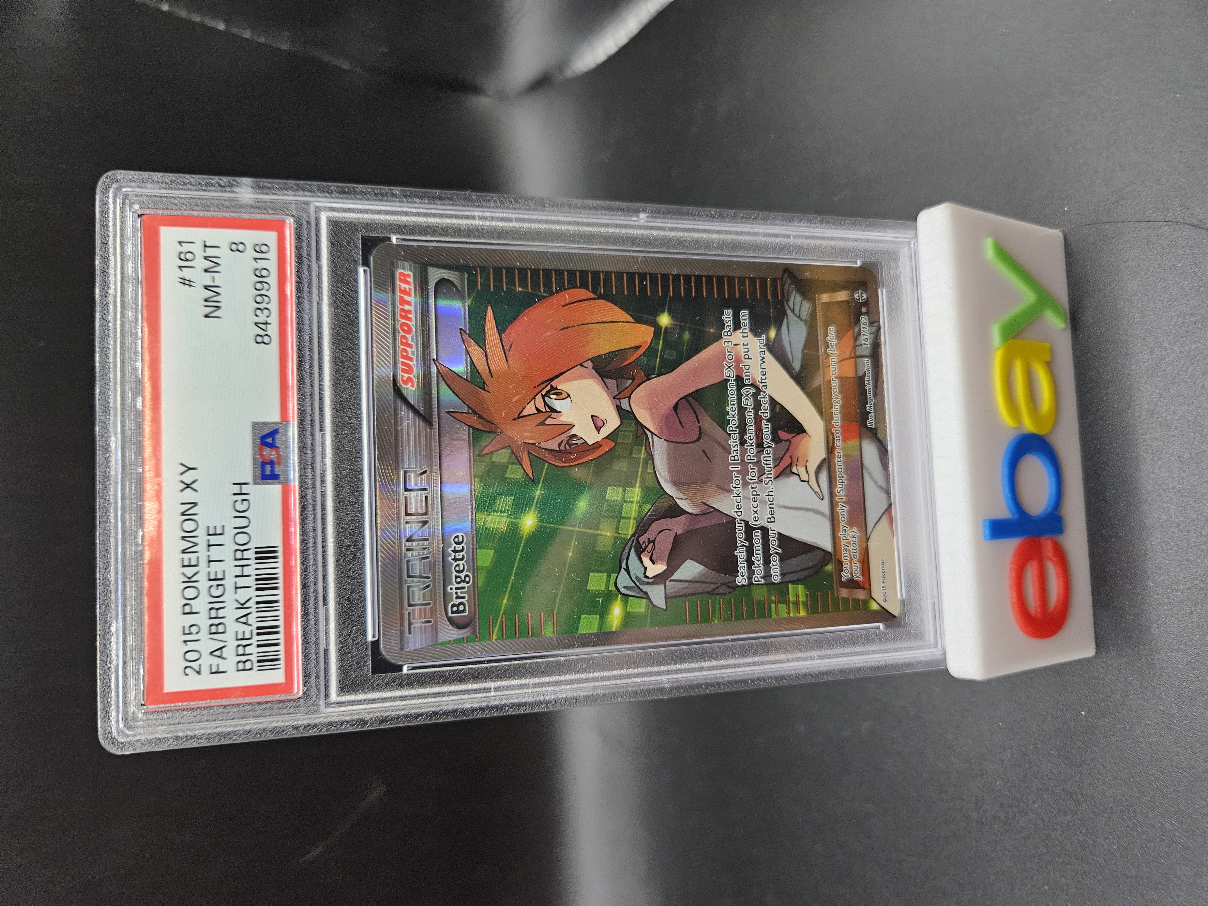 Pokémon TCG Brigette BREAKthrough 161/162 Holo Full Art PSA 8