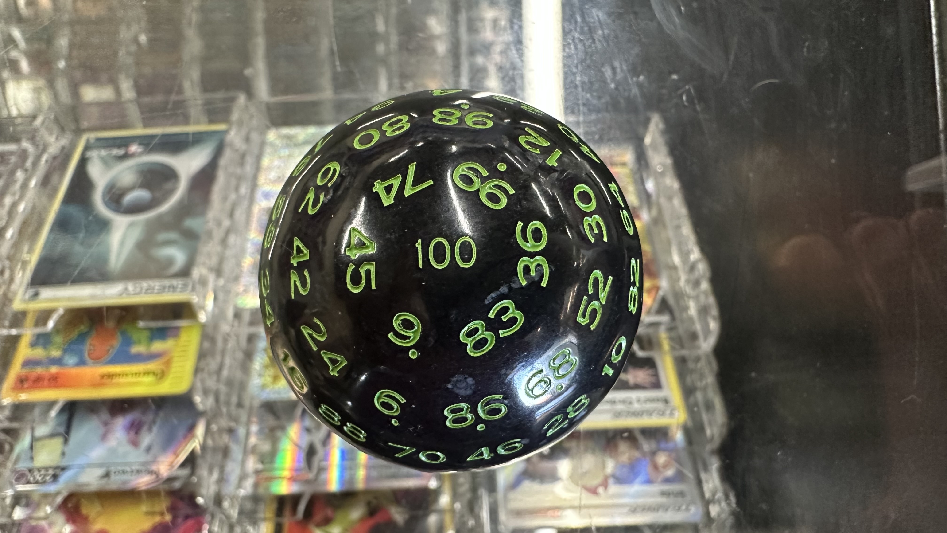 Black w/ Green Lettering d100