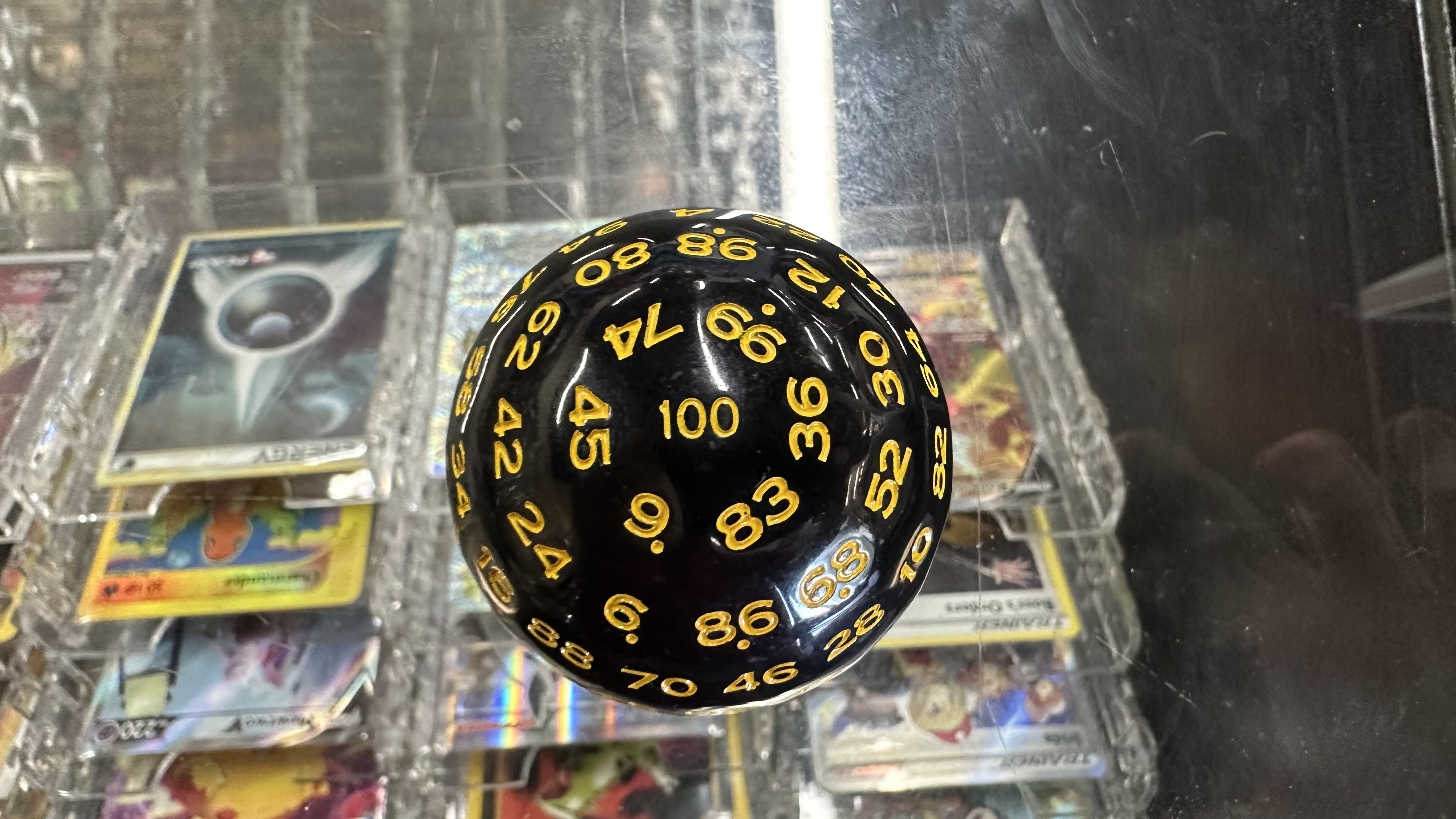 Black w/ Yellow Lettering d100