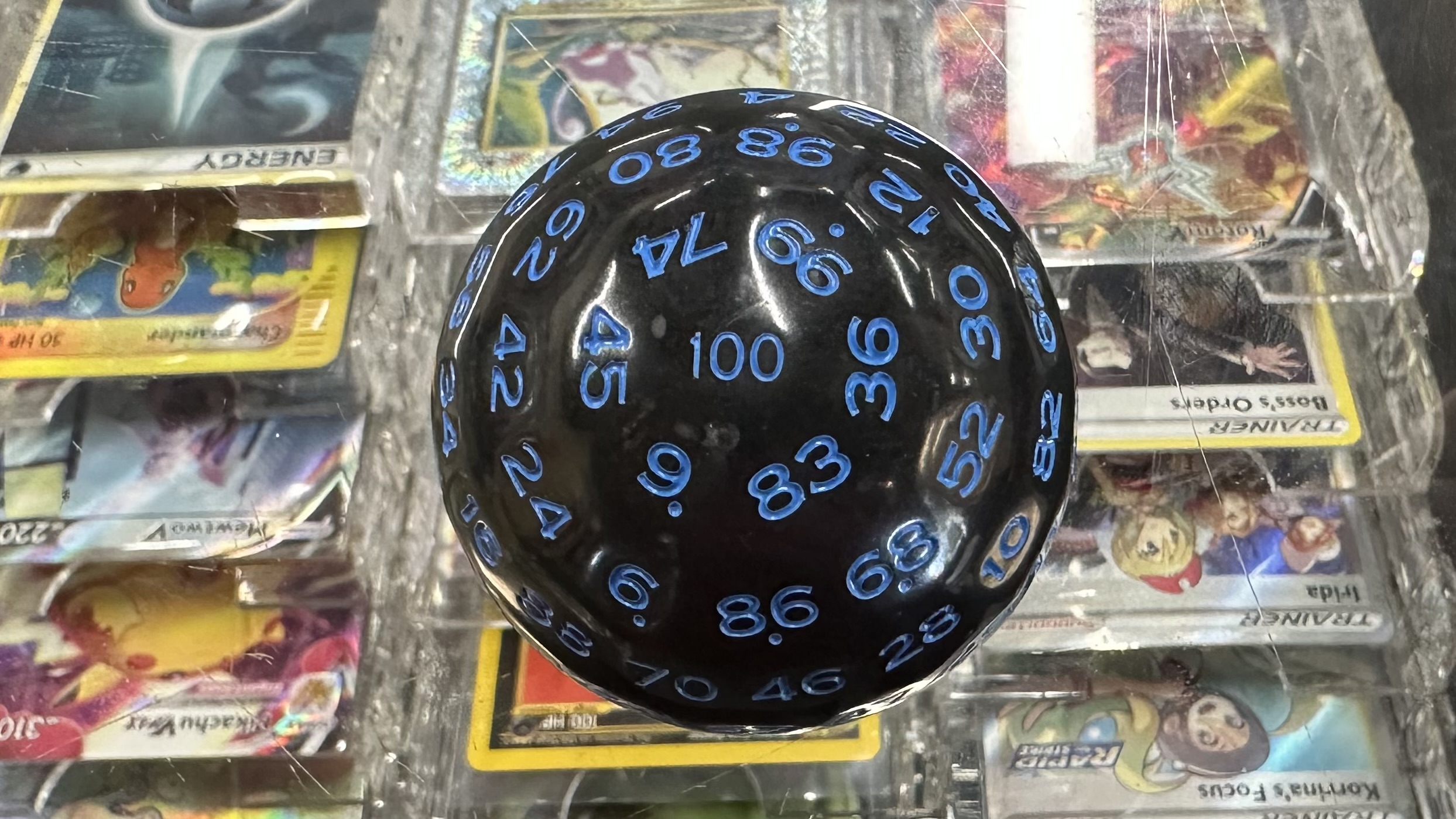 Black w/ Blue Lettering d100