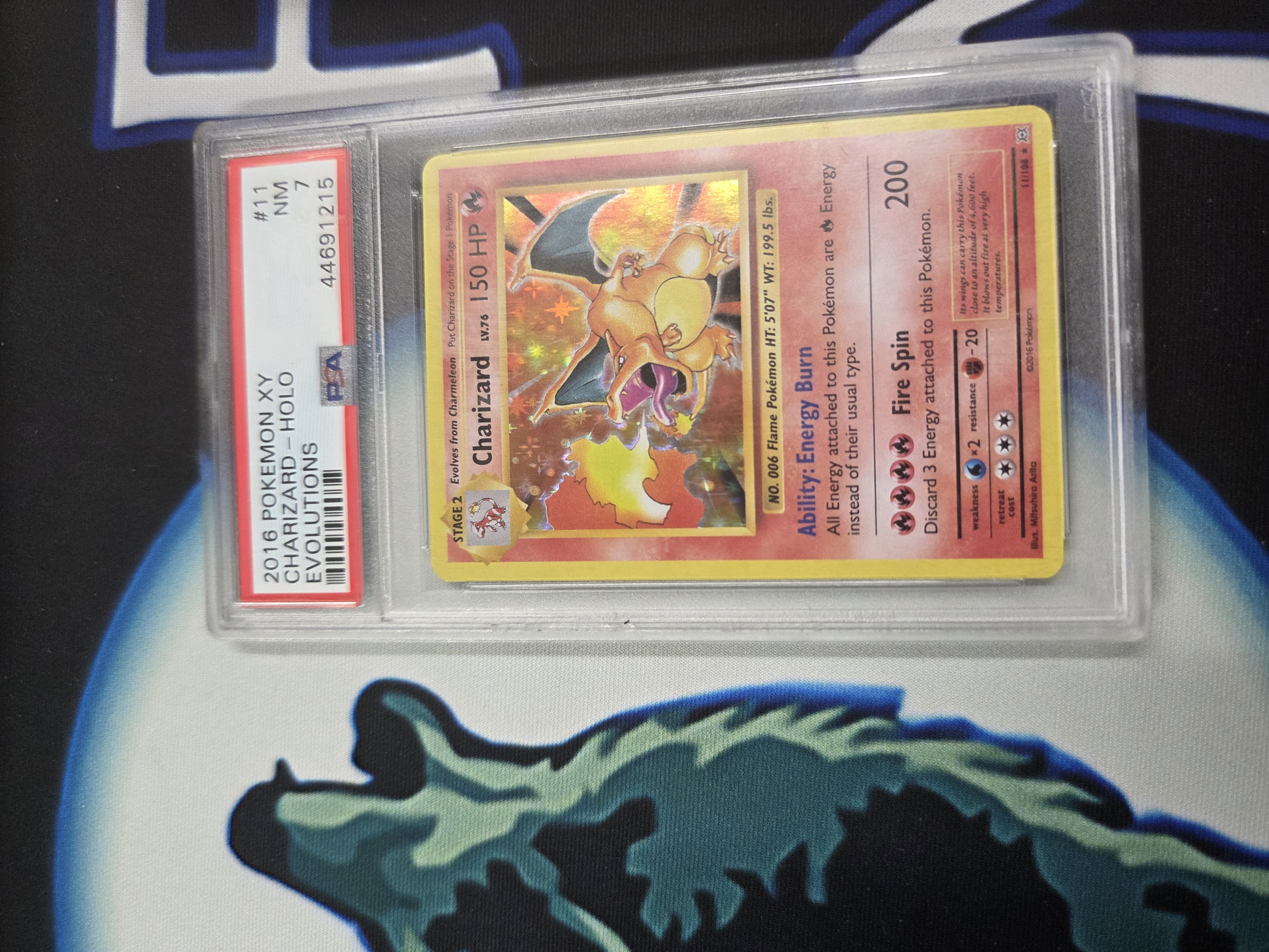 PSA 7 - Charizard - Holofoil - Evolutions #11