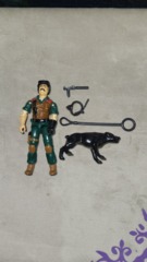 MUTT (v1) DOG HANDLER (K-9)  1984 Comes with Mutt came with a black helmet [see VARIATIONS below], a black face mask, a black Ingram Mac-11 submachine gun with silencer, a black leash, and a black dog named 