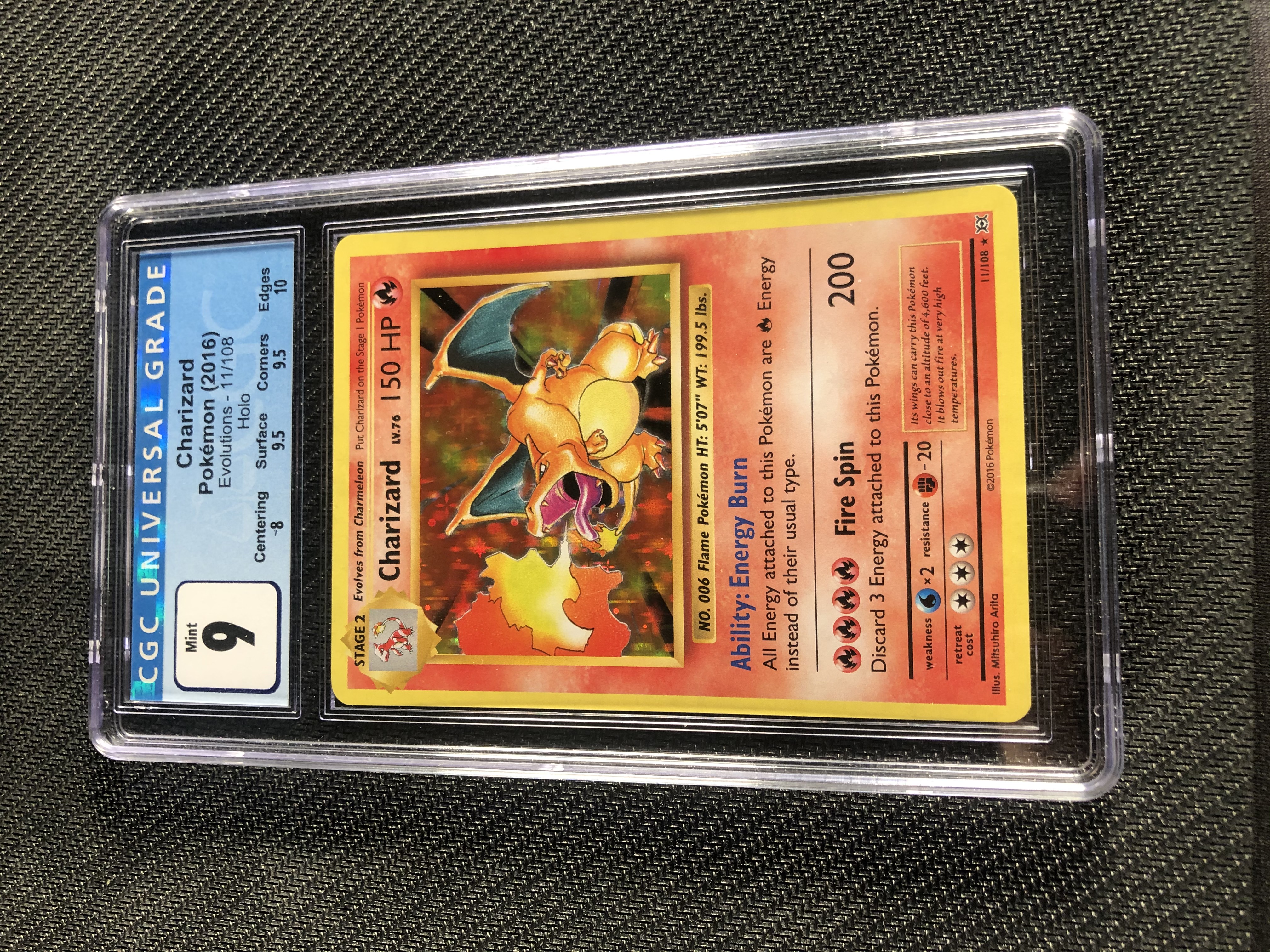 Pokemon Evolutions  Charizard Holo CGC 9