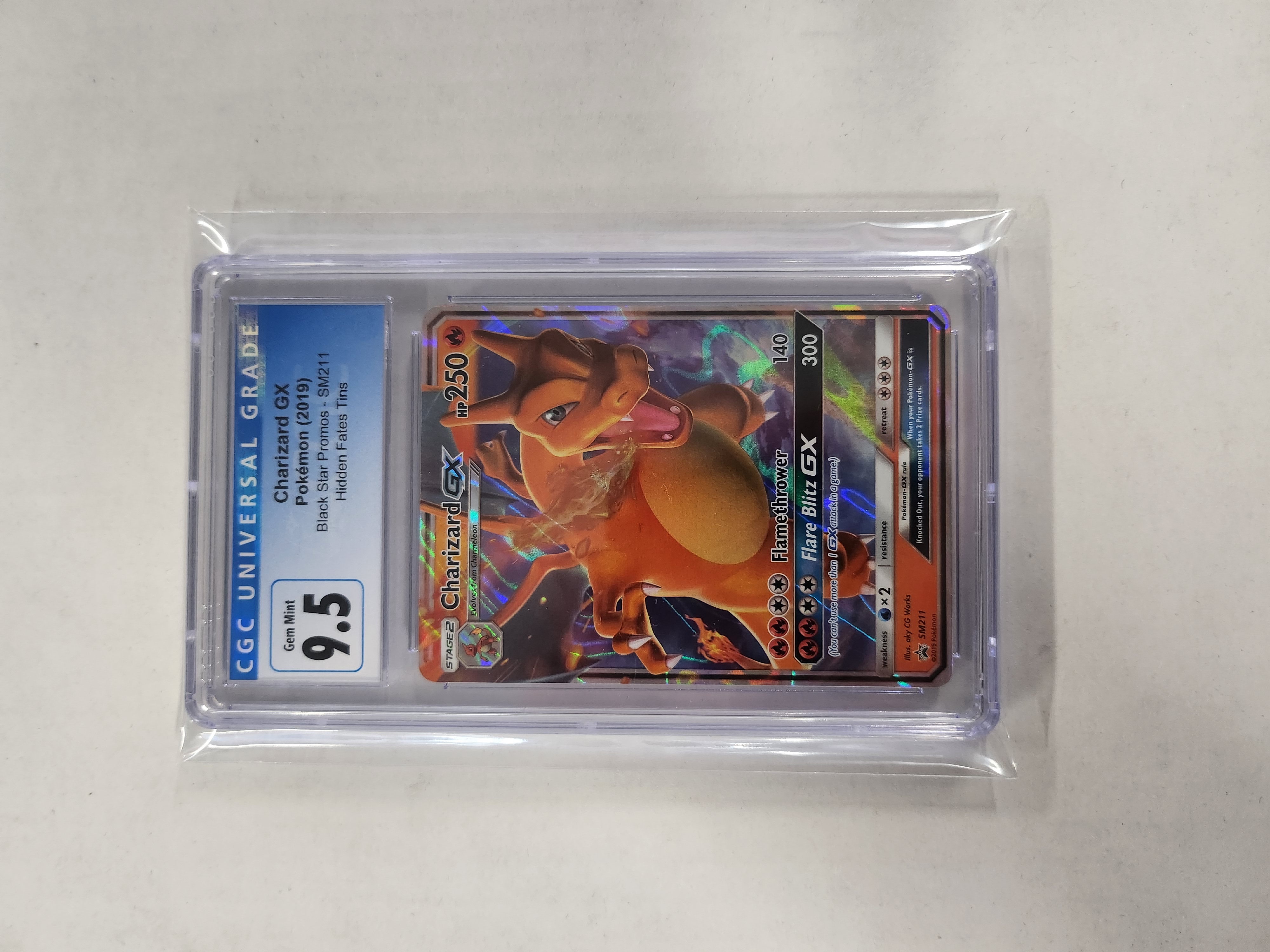CGC 9.5 Charizard GX SM211 Hidden Fates Tins