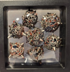 Dice Set: 7 Set Polyhedral Hollow Metal Silver Red Spikes MM785