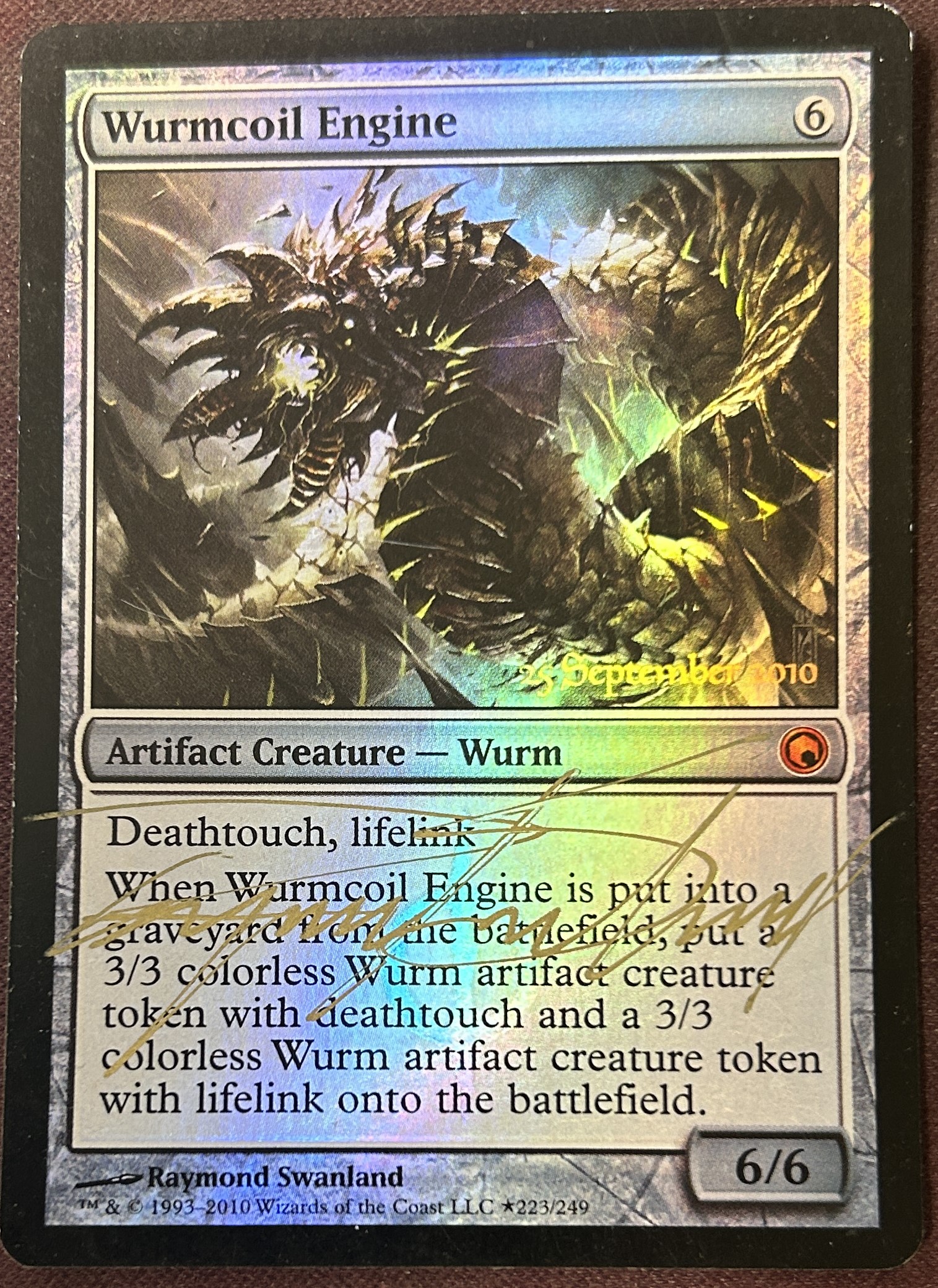 Wurmcoil Engine Foil Prerelease Raymond Swanland